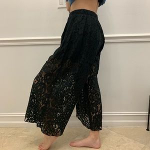 Black palace pants with shorts lining size S
